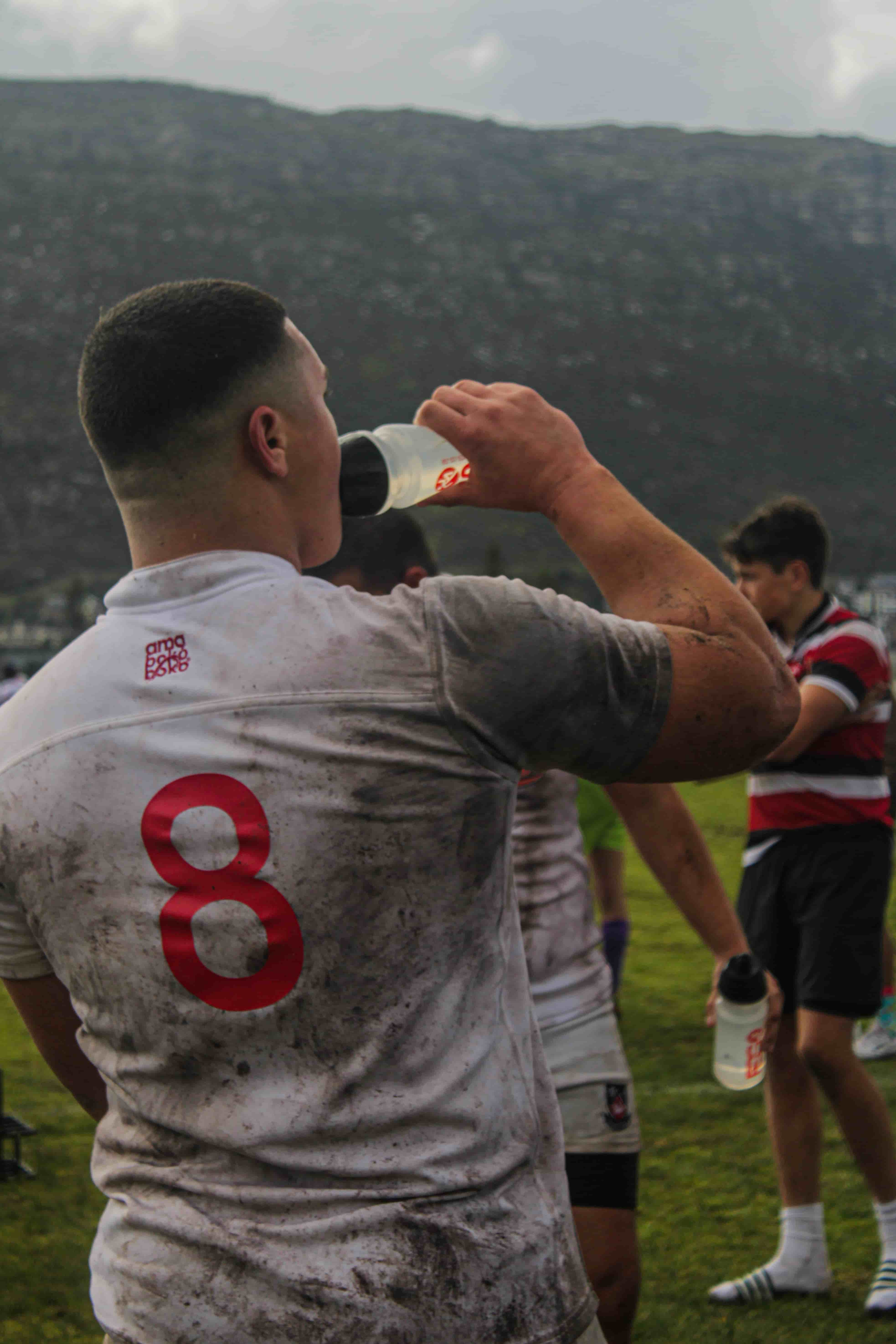 Image of a rugby player drinking water